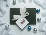 Weihnachtsgeschenk aus Lebkuchen im Geschenkkarton (11x18cm) von Festkeks -weiß, silber