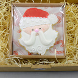 Weihnachtsmann im Geschenkkarton - Fest Keks